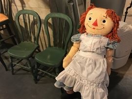 Oversize Raggedy Ann, and chairs