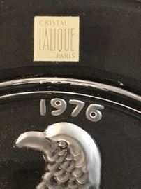 Close up of the label on the signed Lalique 1976 Commemorative plate