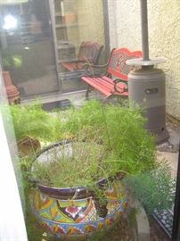 Patio bench, Patio heater (includes propane tank - full), little Chiminea with a log ready to burn.