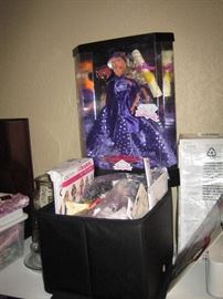 February Birthday Treasures Barbie doll with material remnants, Barbie patterns for clothes, and some embellishments.