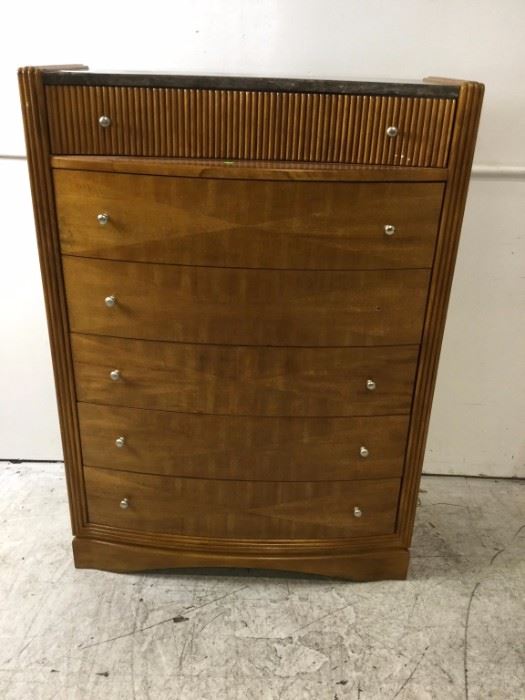 lots of dressers and chests of drawers