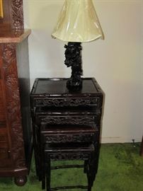 Set of 4 hand carved Chinese Nesting tables
