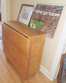 table with storage, folds out to dining table