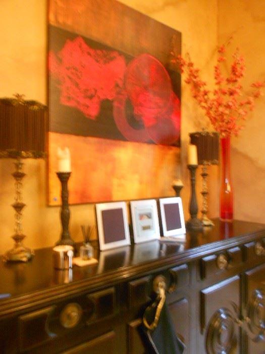Over sized buffet table, with lacquer art above.