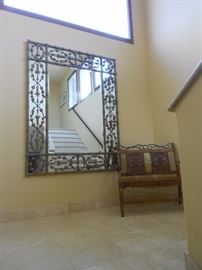Landing on one of the two stair cases.  This mirror is huge, with a wonderful metal design of foliage. Bench for 2, for you romantics!