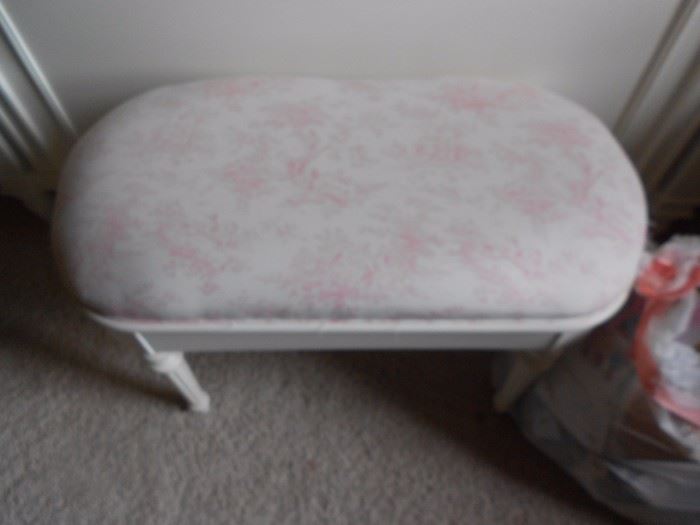 Pink and white bench.