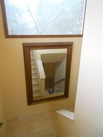 Another lovely, over sized mirror in landing of stairs.
