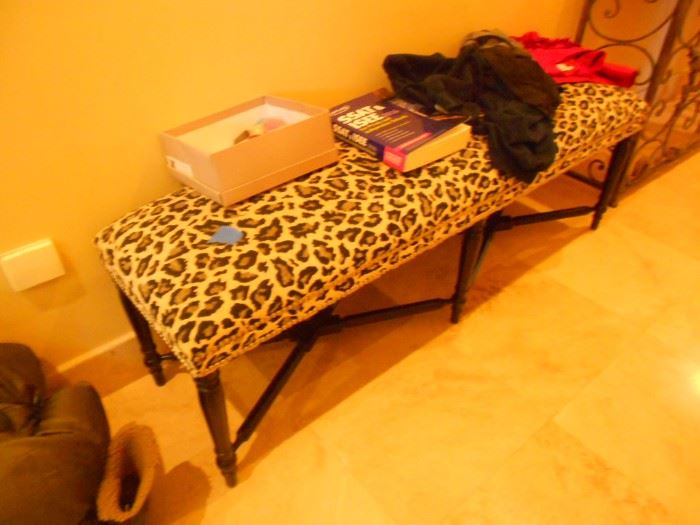 Long and narrow bench in leopard print.  Faux animal print is timeless and always elegant, but the real stuff went out of style a long time ago! #FurisDead