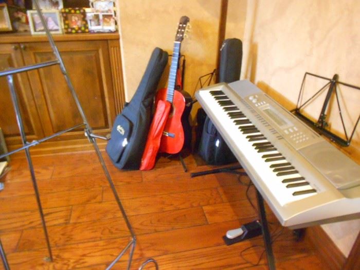 Electric keyboard and guitars.