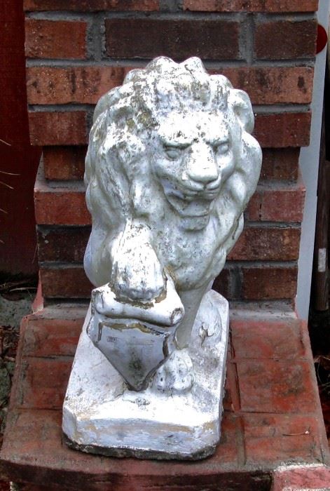 One of four matching concrete lions