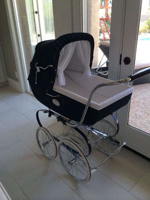 Inglesina Classica Pram- navy used in excellent condition! $550
Inspired by nineteenth-century British aristocracy and refined in Italy by Inglesina, there is nothing quite like the Classica. This enduring model of family and tradition features a timeless yet uniquely contemporary design.
Handcrafted in Italy by skilled artisans using only the finest materials, the Classica places your child at the pinnacle of safety, comfort and style.
The Classica, however, is not for everyone. It is only for those looking for an exclusive family heirloom, to be admired and remembered for generations.
The Chassis and Pram:The internal lining is completely removable and washable, The backrest can be adjusted manually and has a recline positions., The pushchair seat transforms the pram into a stroller and is reversible(i.e. the 
5 position on the chassis can face the mommy or the street, as preferred). Equipped with bar-linked rear suspension brake. Equipped with spoked rubber wheels, Adjustable handle