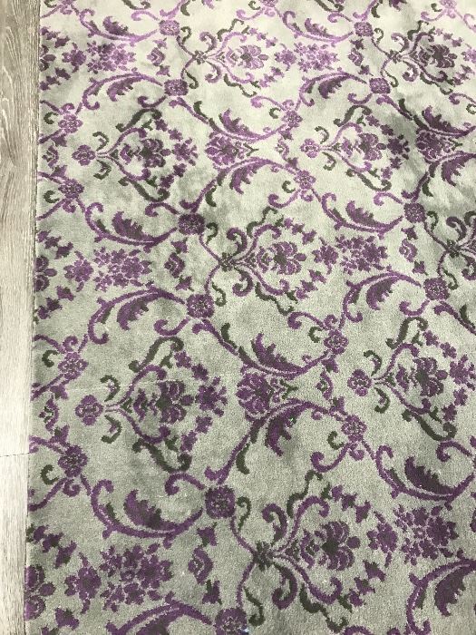 13ft x 122 inches purple damask rug. $250