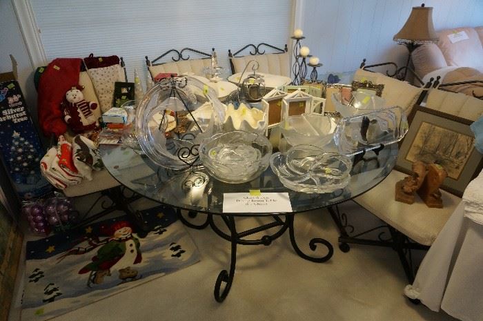 Wrought Iron Dining Table with Glass Top and 5 matching chairs