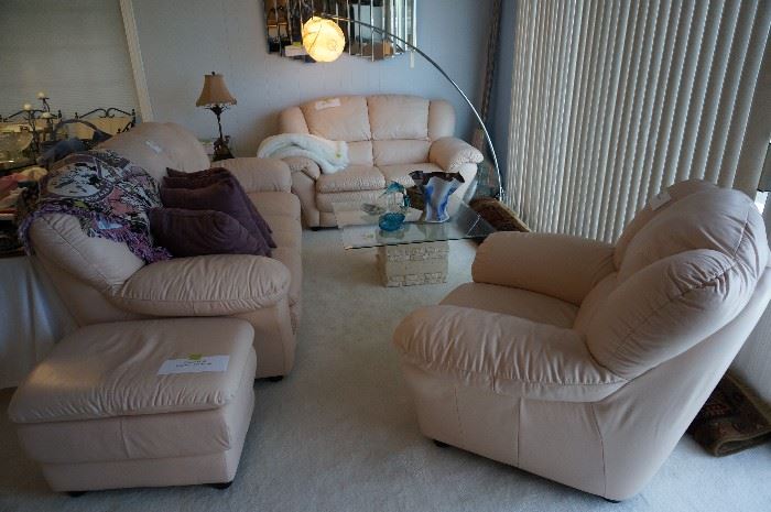 4 pieces....blush pink leather sofa, loveseat, recliner, and ottoman.....like new condition!