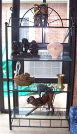 Iron shelf unit in the sunroom