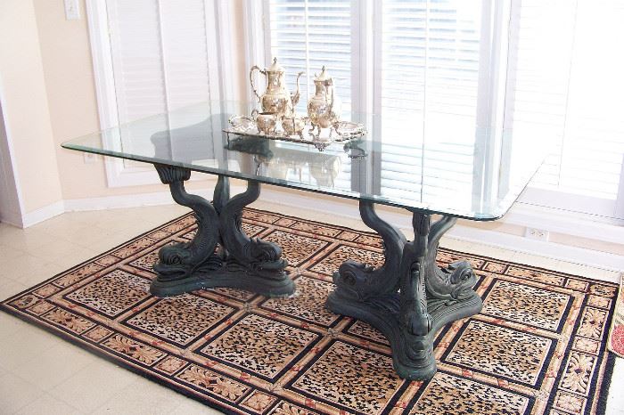 Great looking glass top table - glass is beveled on the edge