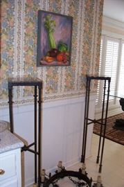 Pair of iron plant stands with a marble top