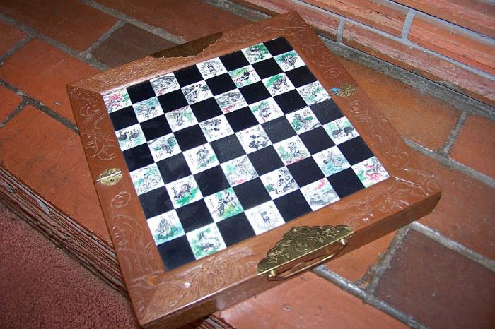 Chess set (chess pieces in slide out drawers on each side of the board)
