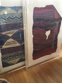 Jack Silverman lithographs framed in plexiglass. The artist has the blankets or rugs, and creates the lithographs with a two dimensional quality.