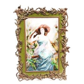 Art Nouveau Enameled Picture: An early 20th century Borval Art Nouveau enamel painting. Boasting of a fantasy style image of a beautiful woman in an edenesque-like garden. Housed in a bronze toned floral and foliate frame, with a green velvet border.