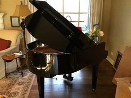 D. H. Baldwin ebony baby grand piano 
