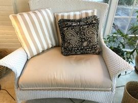 Pair of oversized white wicker chairs