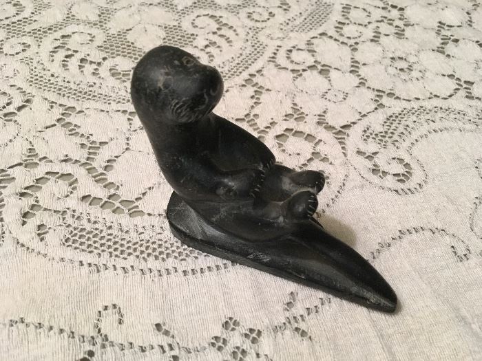 Early Inuit soapstone carved sea otter. Signed 