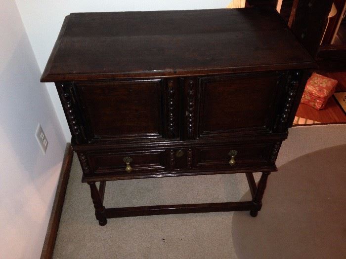 Antique cabinet, top has split, this will need repair. Still an excellent piece with great detailing.  