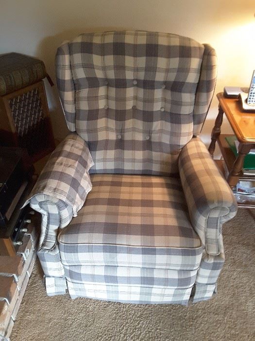 Plaid Armchair with Blue and White Pattern.