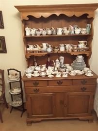 Hutch Sideboard with Ceramic Creamers and Porcelain collectibles, Pierre Stand with collectible  plates.