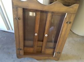 Kitchen wall cabinet with two doors.