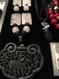 Carved ebony pendant and rose quartz beaded necklace