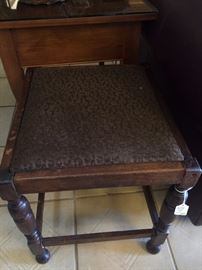 Small stool with upholstered seat