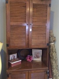 Louvered storage cabinet
