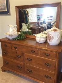 Seven drawer maple dresser (has matching chest); antique bedroom set (bowl, pitcher, and chamber potty)