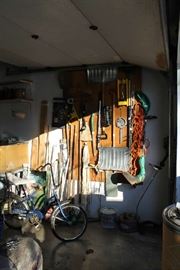 Garden tools and vintage Huffy girls bike with banana seat