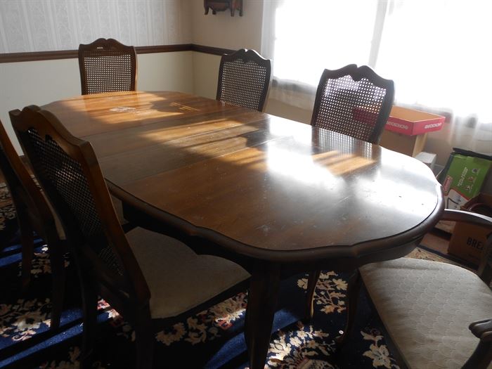 dining table w/4 chairs and 2 arm chairs   (2 leaves are added now)