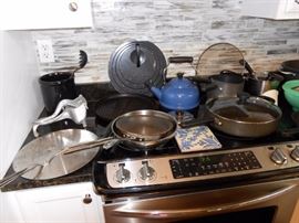 all-clad, the pampered chef, le creuset