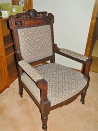 This antique armchair is near mint.