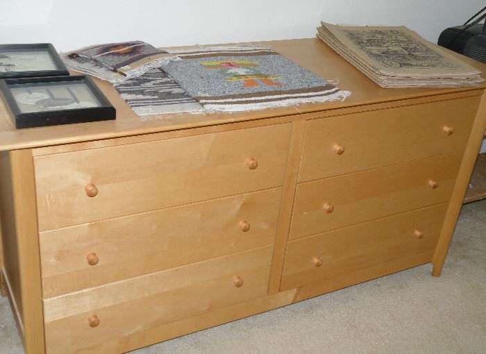 Blonde wood chest of drawers. 