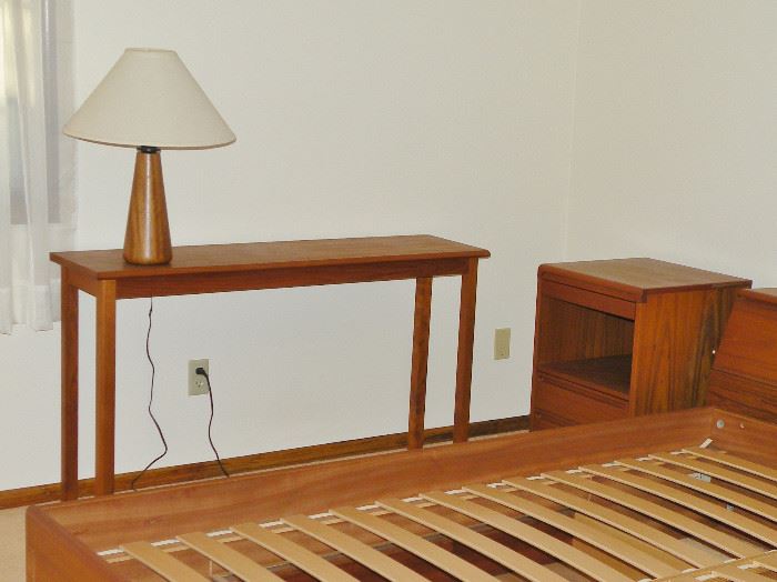 Teak sofa table. Scandinavian style lamp.