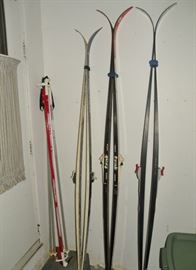 Three pair of cross country skis