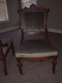 Two (2) restored Victorian Chairs with original caster on front legs .
