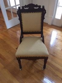 Restored Victorian style Chair with original casters in front