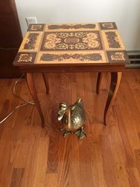 inlay table and bronze duck