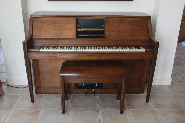 player piano with over 40 rolls