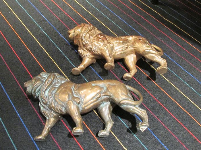 Brass lions.