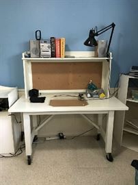 Roll away desk with glass insert and cork board