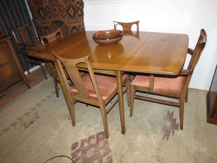 Beautiful Table an 6 chairs with extra leaves, By Whites Sweet retro set Wood is Walnut
