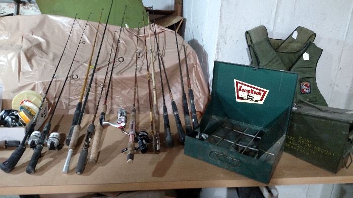 Fishing rods, life jackets for fly fishing and small vintage camping stove